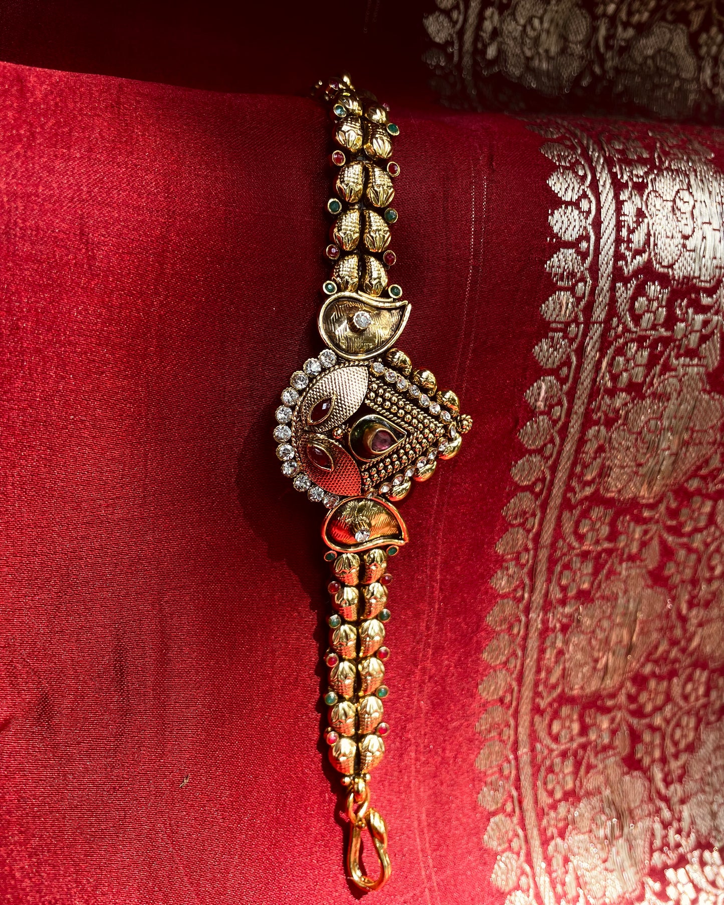 Drop of the Deccan | Antique Gold Plated Bracelet with Rich Stonework | Edit त्रिकाय