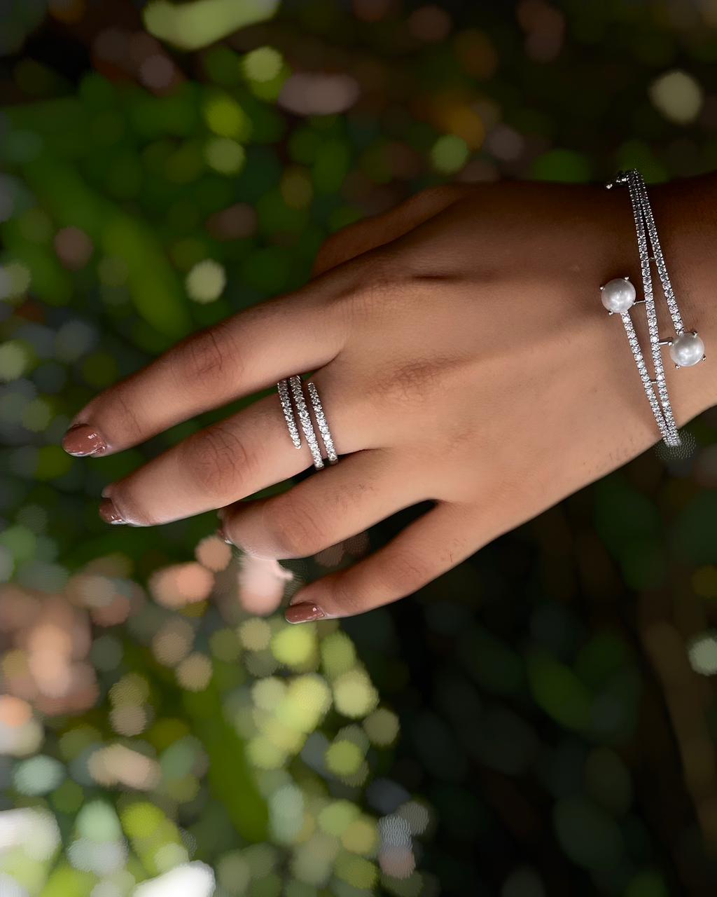 Ivory Arc | A rhodium-finished kada with twin pearls and fine American Diamond stones.